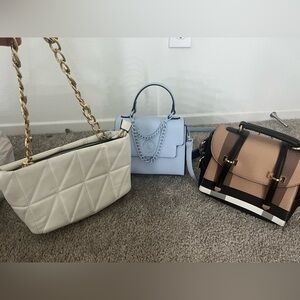 3 women’s fashion bags. (Baby Blue bag is Aldo). All three for $20.